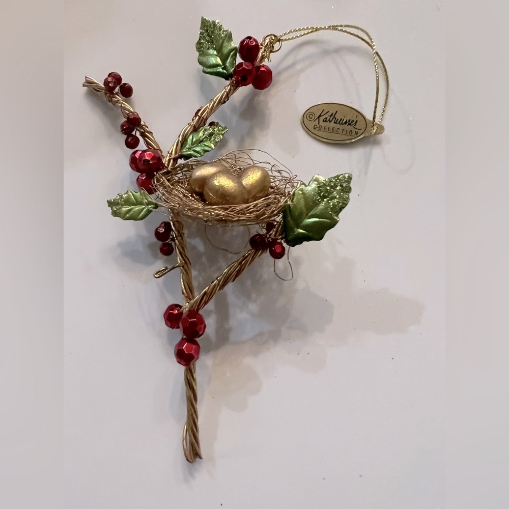 Katherine’s collection wire birds nests on holly branches